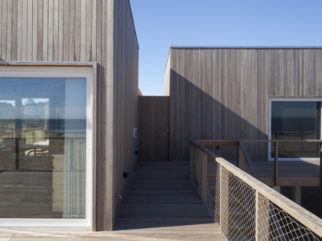 Casa de la playa en Chihuahua, Colle-Croce (Brasil) - La terraza comunica ambos espacios.