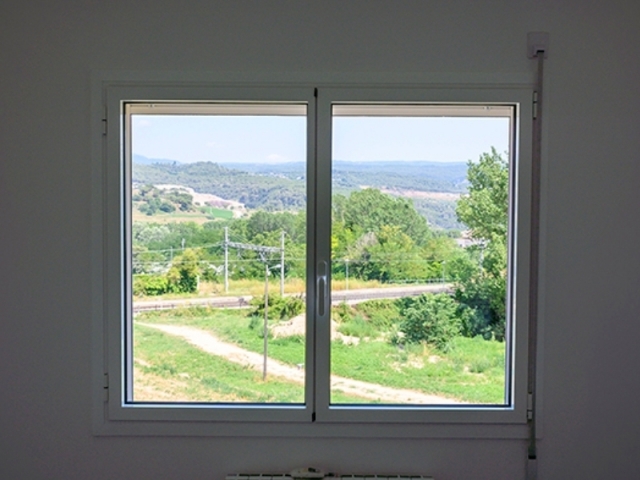 Casa Centelles - Aluminio y vidrio en las aberturas.